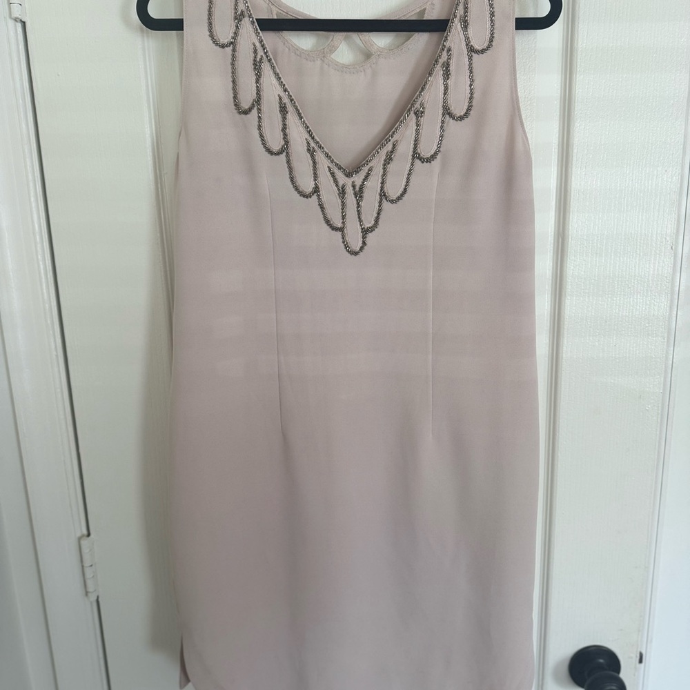 Elegant Sleeveless Dress with Beaded Neckline